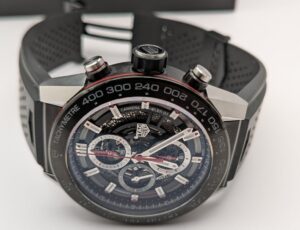 Tag heuer caliber 01 chrono w/rubber strap and bracelet